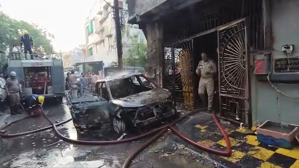 8 Dead After Charging Sparks Fire